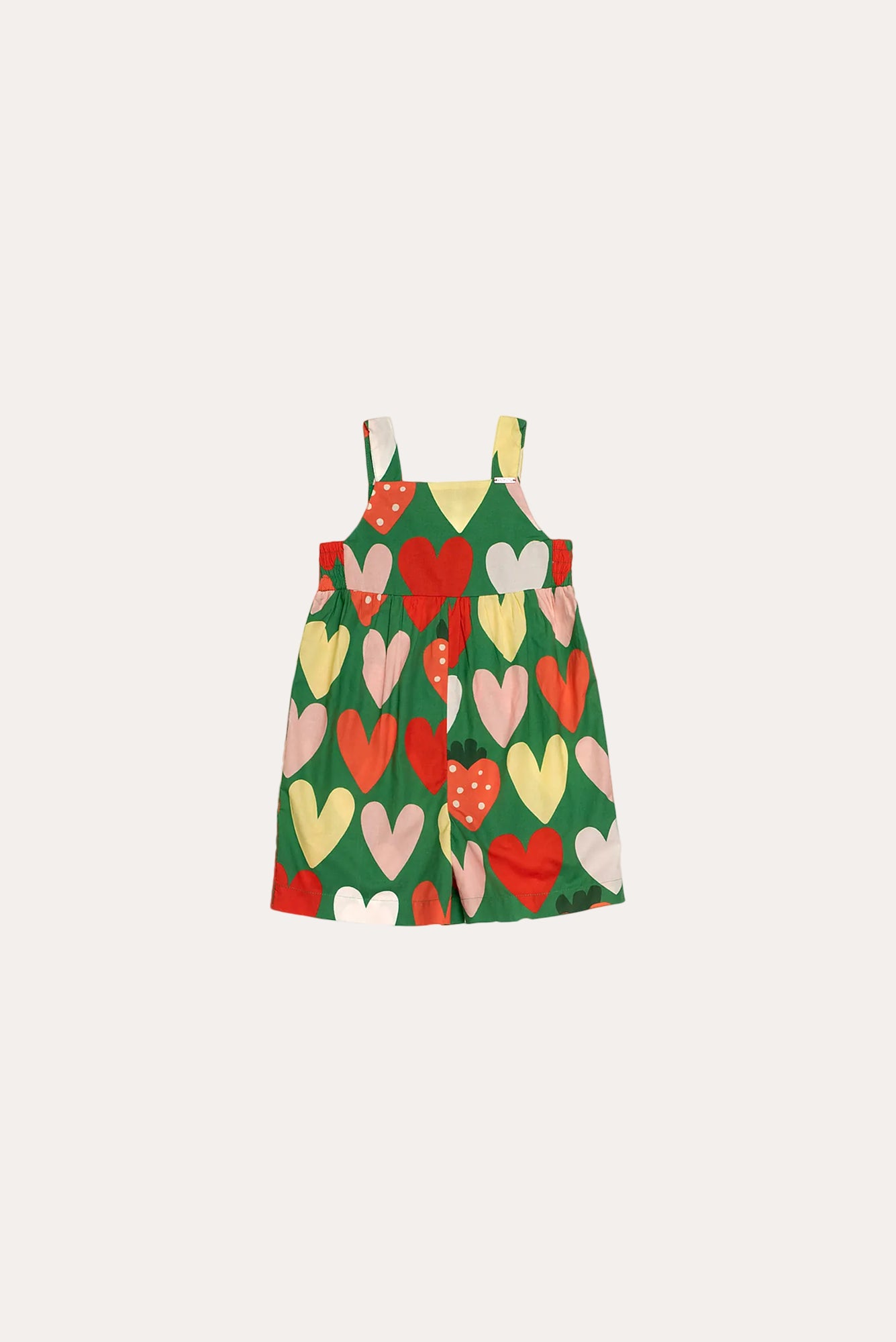 Macacão infantil com estampa de corações coloridos em verde, vermelho e amarelo