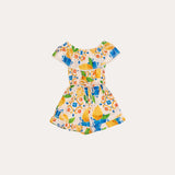 Macacao feminino infantil com estampa de limões e flores em azul e amarelo