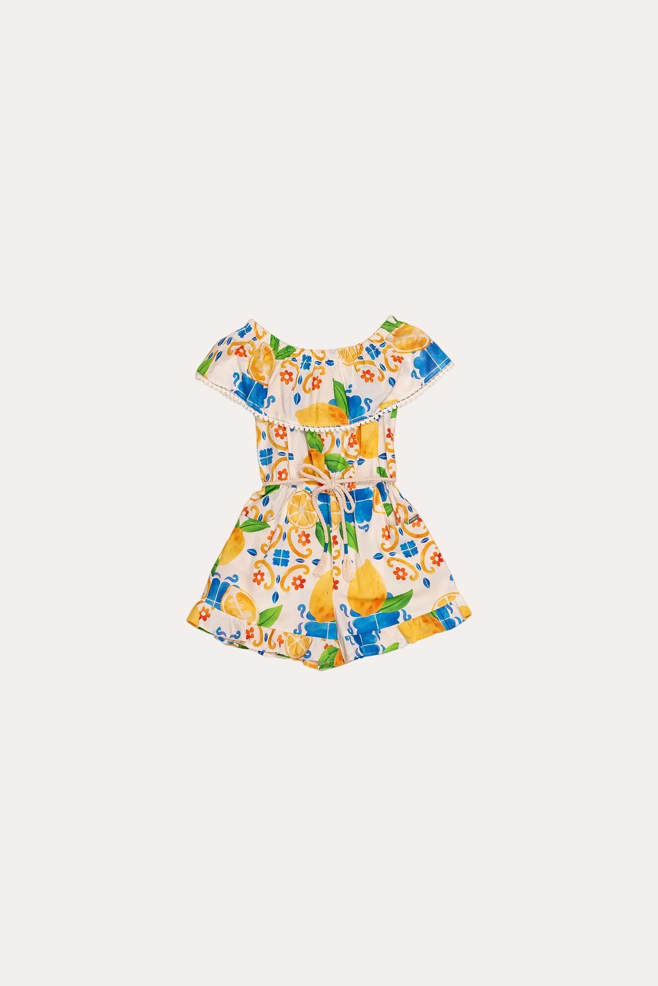 Macacao feminino infantil com estampa de limões e flores em azul e amarelo