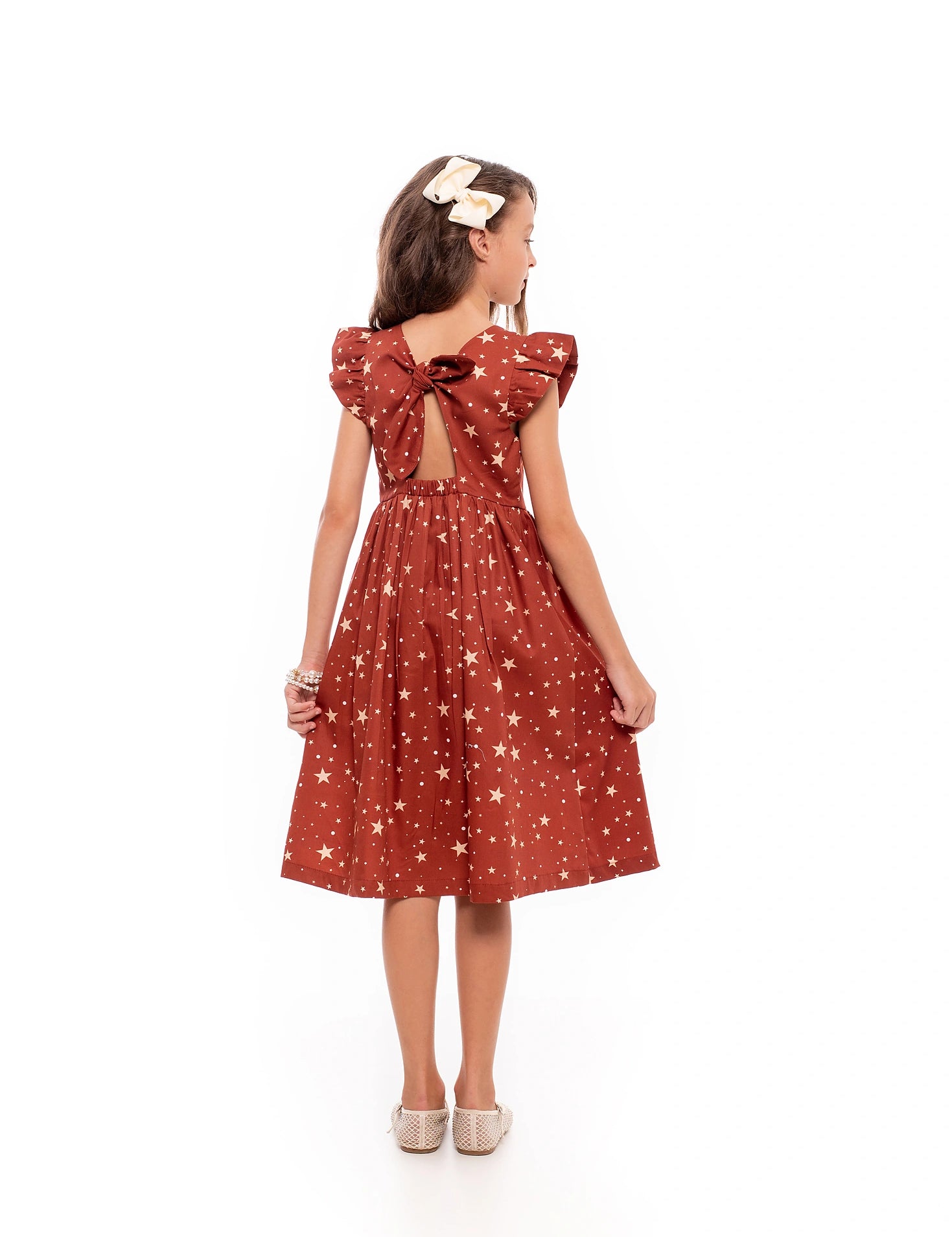 Vestido curto feminino infantil com alças largas, estampa de estrelas e saia ampla