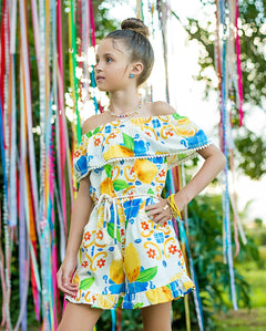 Macacao feminino infantil com estampa de limões e flores em azul e amarelo
