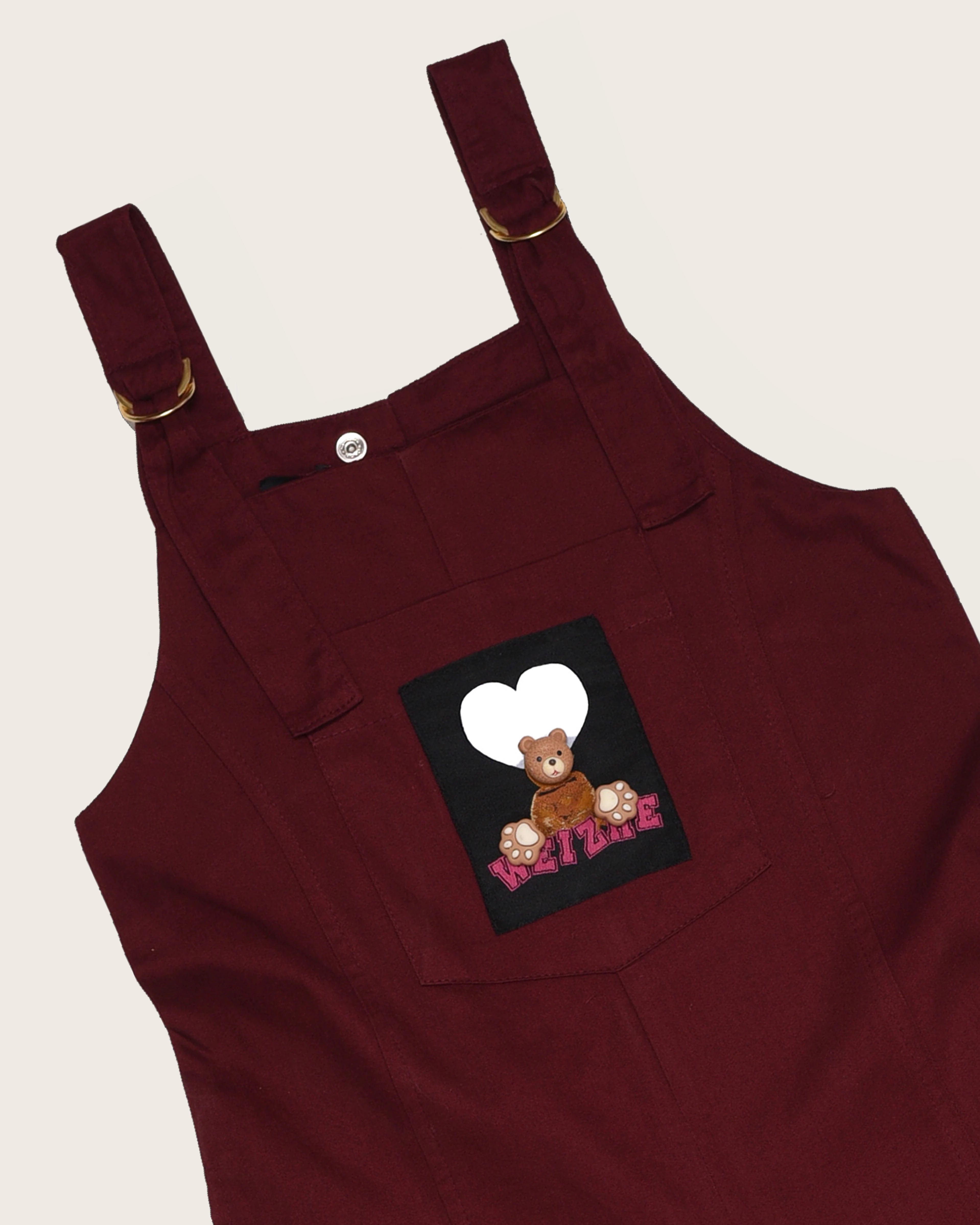 Macacão em tom vinho com detalhe lúdico infantil feminino Antonita para meninas 