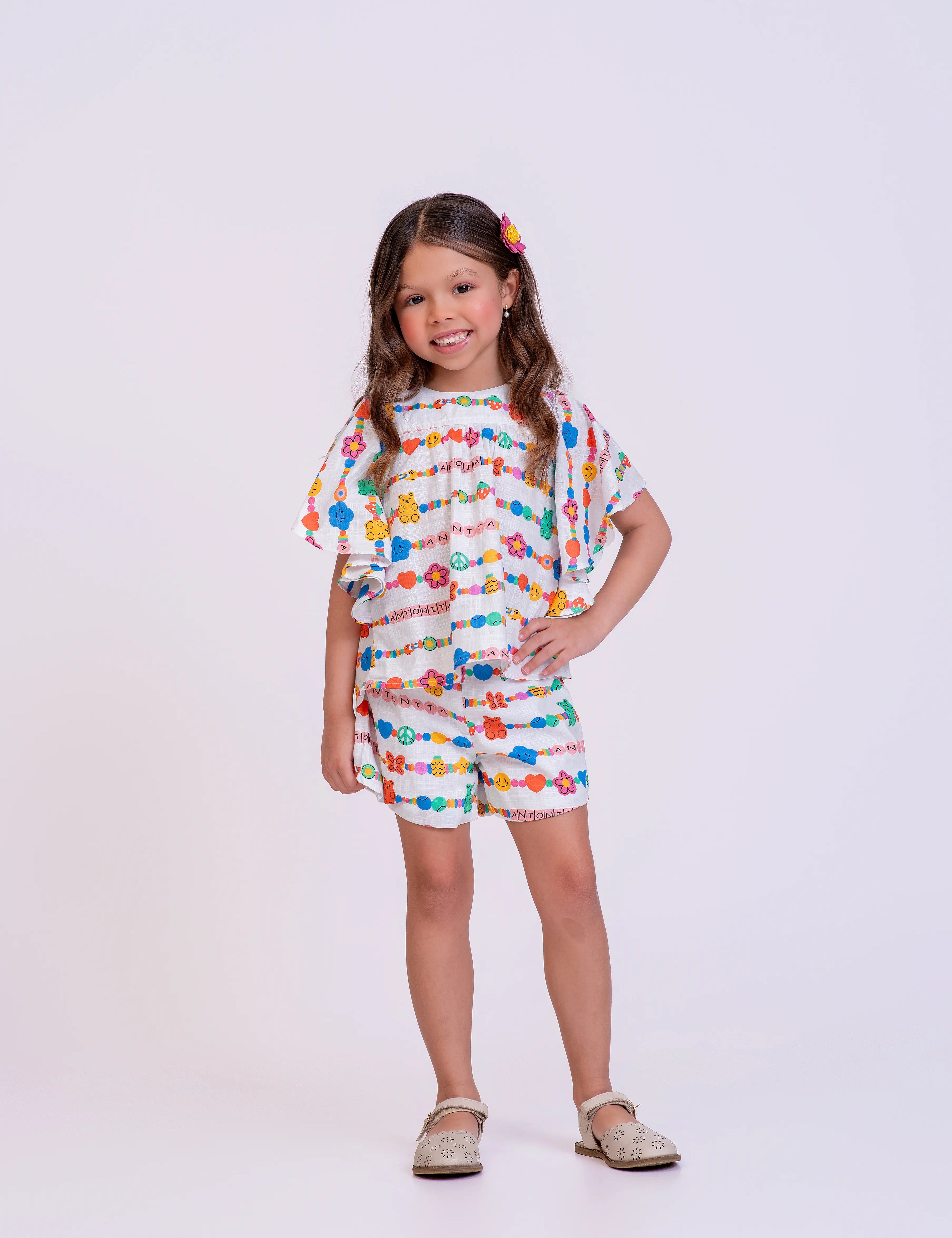 Conjunto com blusa de mangas amplas e short floral infantil feminino Antonita para meninas de 4 a 12 anos