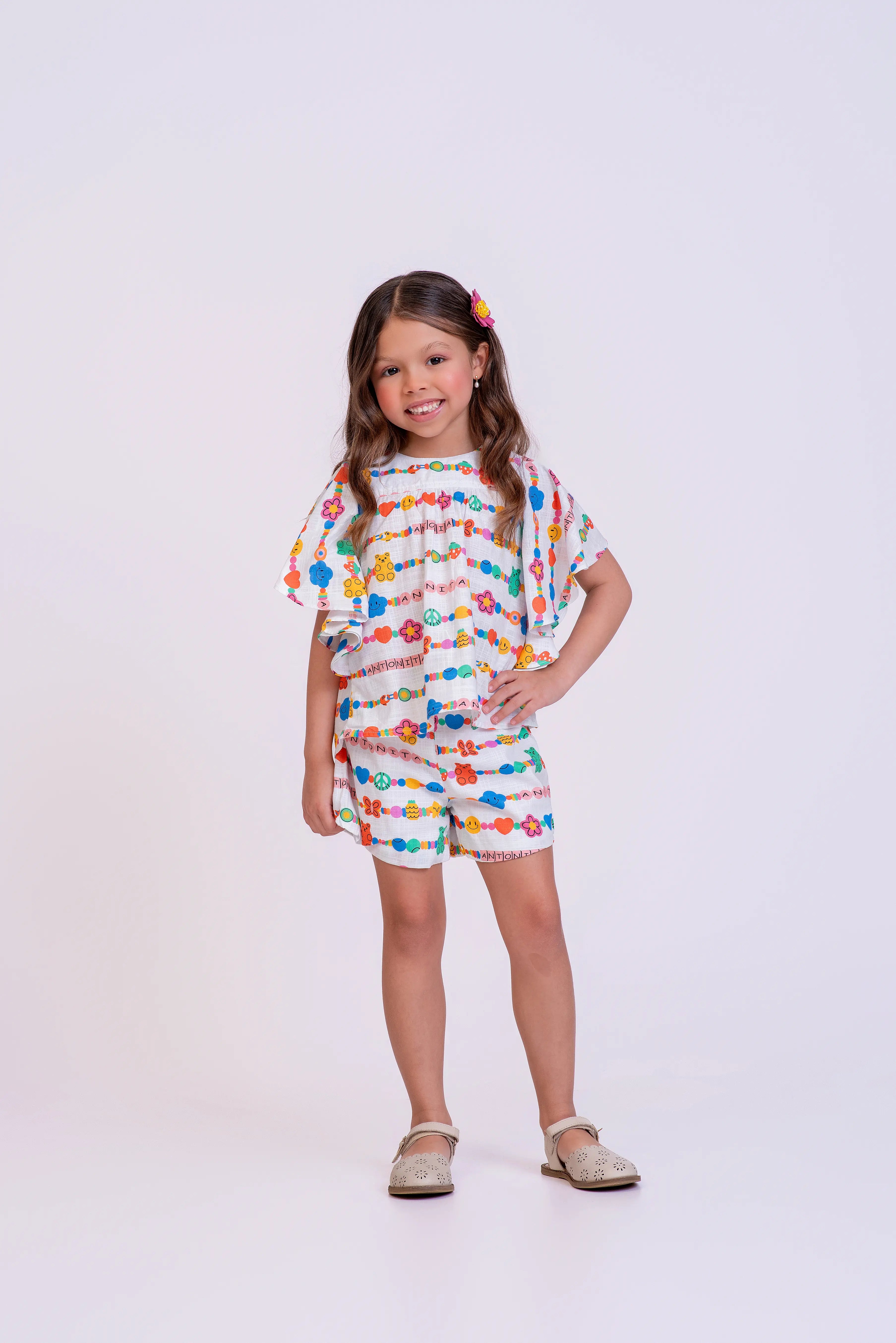 Conjunto com blusa de mangas amplas e short floral infantil feminino Antonita para meninas de 4 a 12 anos