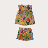 Conjunto infantil feminino com blusa de alças largas e saia, estampa floral colorida