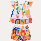 Conjunto infantil feminino com blusa de mangas amplas e short estampado de frutas e vegetais