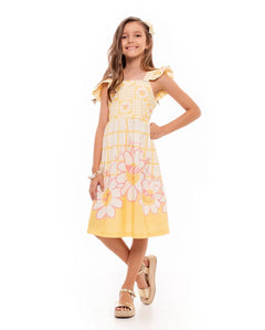 Vestido infantil amarelo com estampa floral e alças largas, detalhe em babados na barra