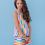 Conjunto infantil feminino com blusa de alças e saia curta listrada em cores vibrantes