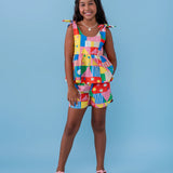 Conjunto infantil feminino com blusa de alças largas e short, estampa geométrica colorida