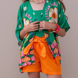 Short feminino infantil com cintura alta e detalhe de laço, peça lúdica e confortável