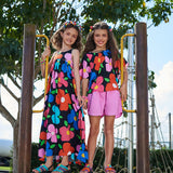Vestido midi feminino infantil com estampa floral colorida e alças com pompons