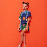 Conjunto infantil feminino com blusa bufante e short colorido em estampa geométrica