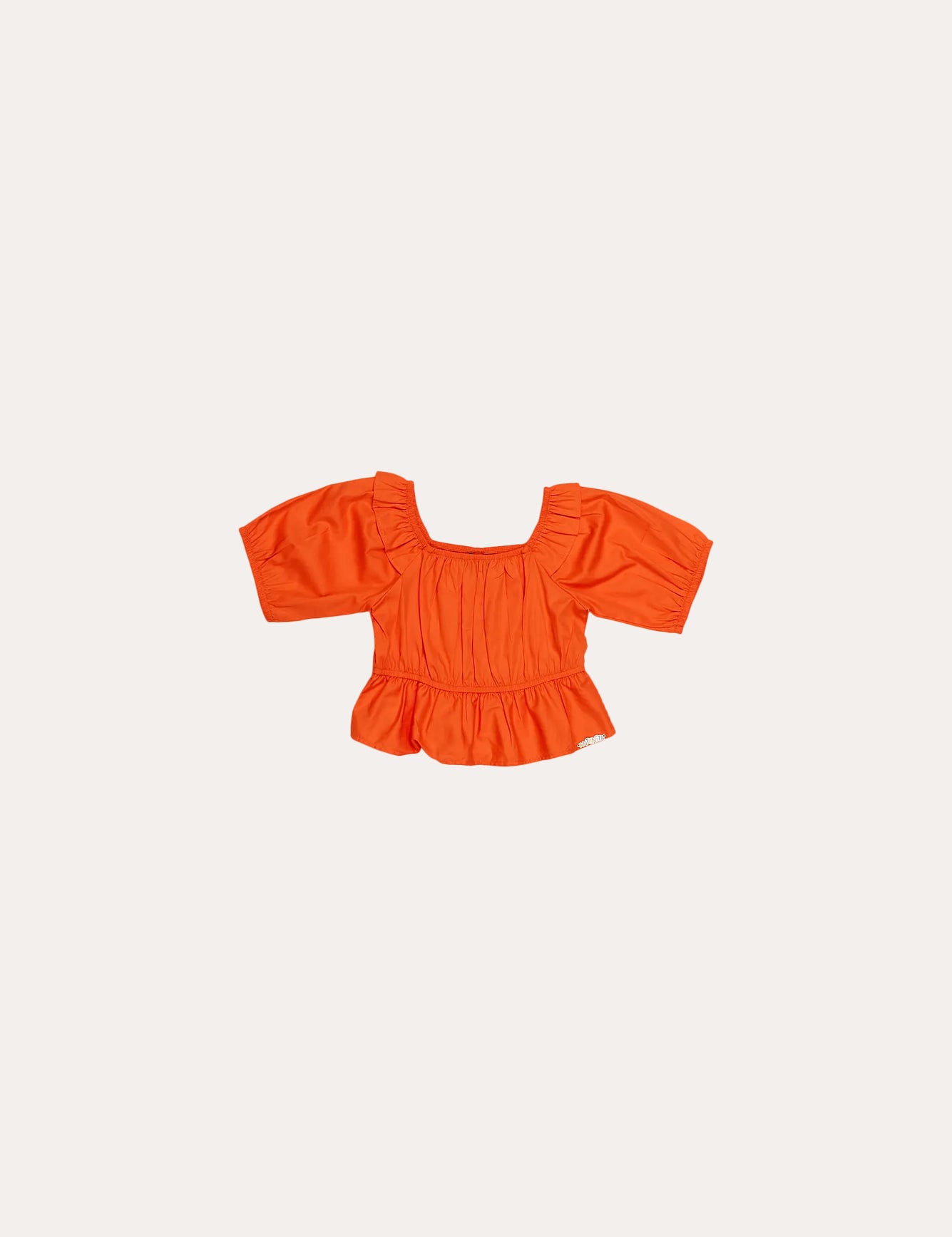 Blusa infantil feminina com mangas bufantes e detalhe de franzido na parte frontal