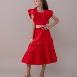 Conjunto infantil feminino com blusa de babados e saia volumosa em camadas