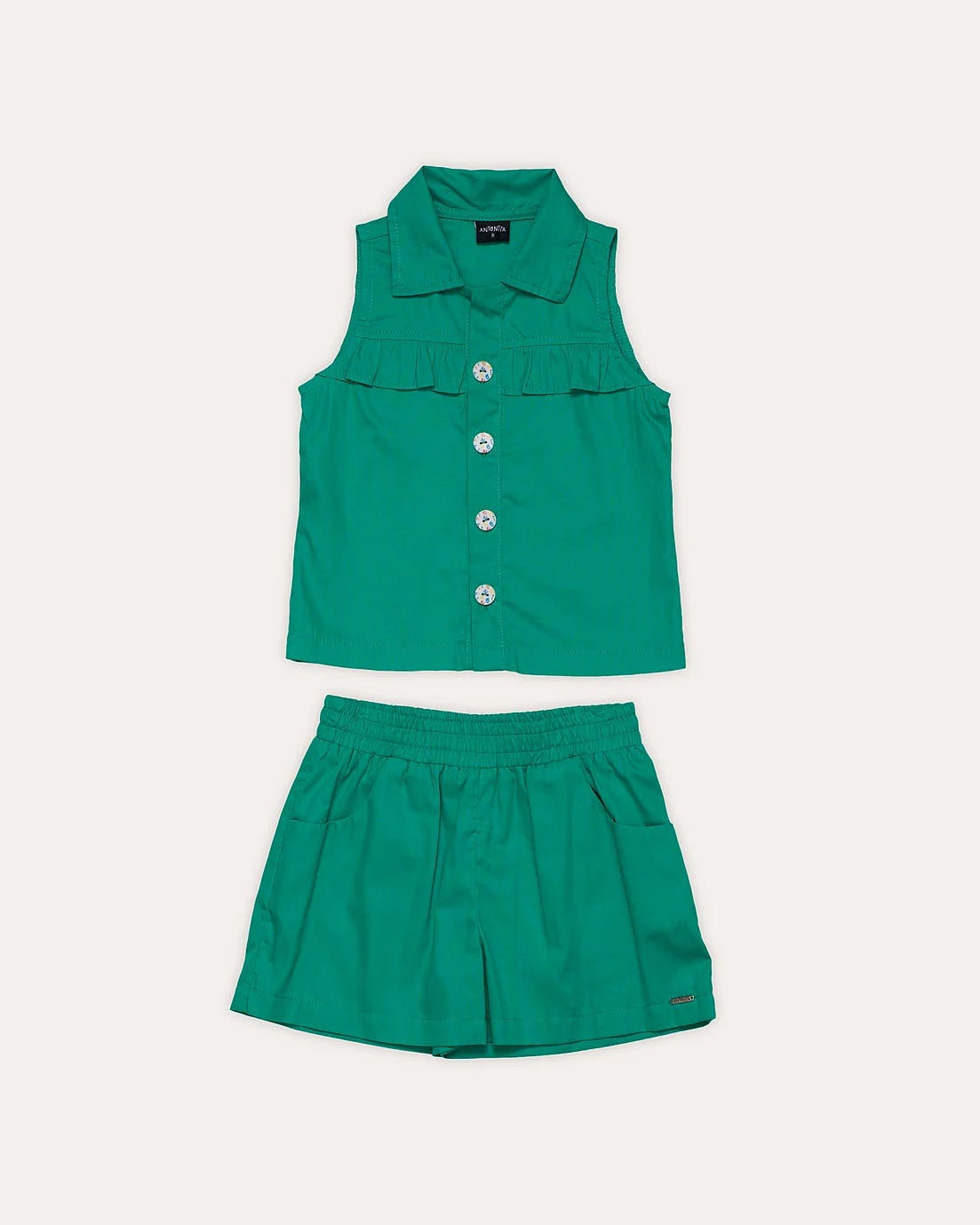 Conjunto infantil feminino verde com blusa sem mangas e saia elástica, detalhes em babados