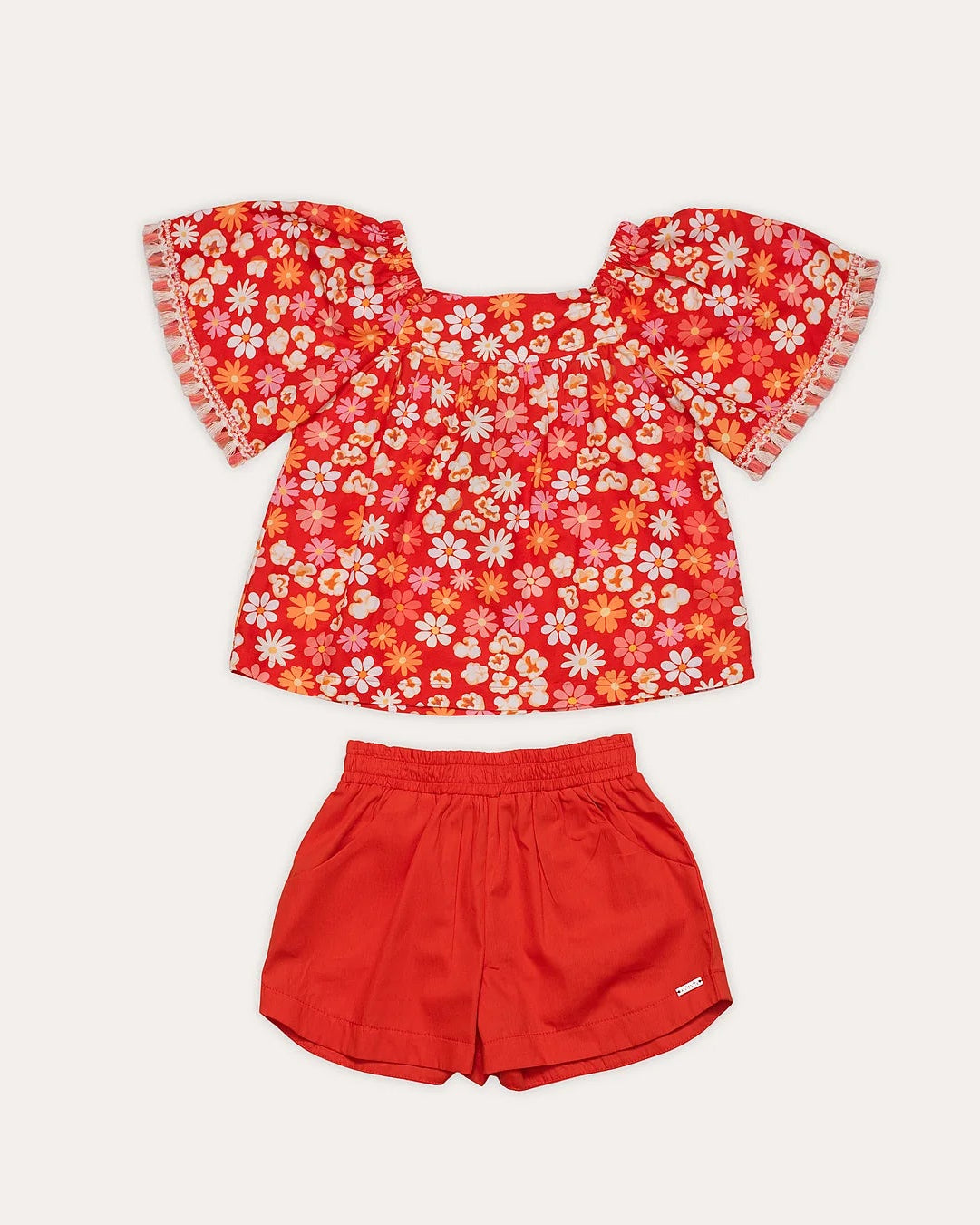 Conjunto infantil feminino com blusa floral vermelha e short liso, ideal para meninas