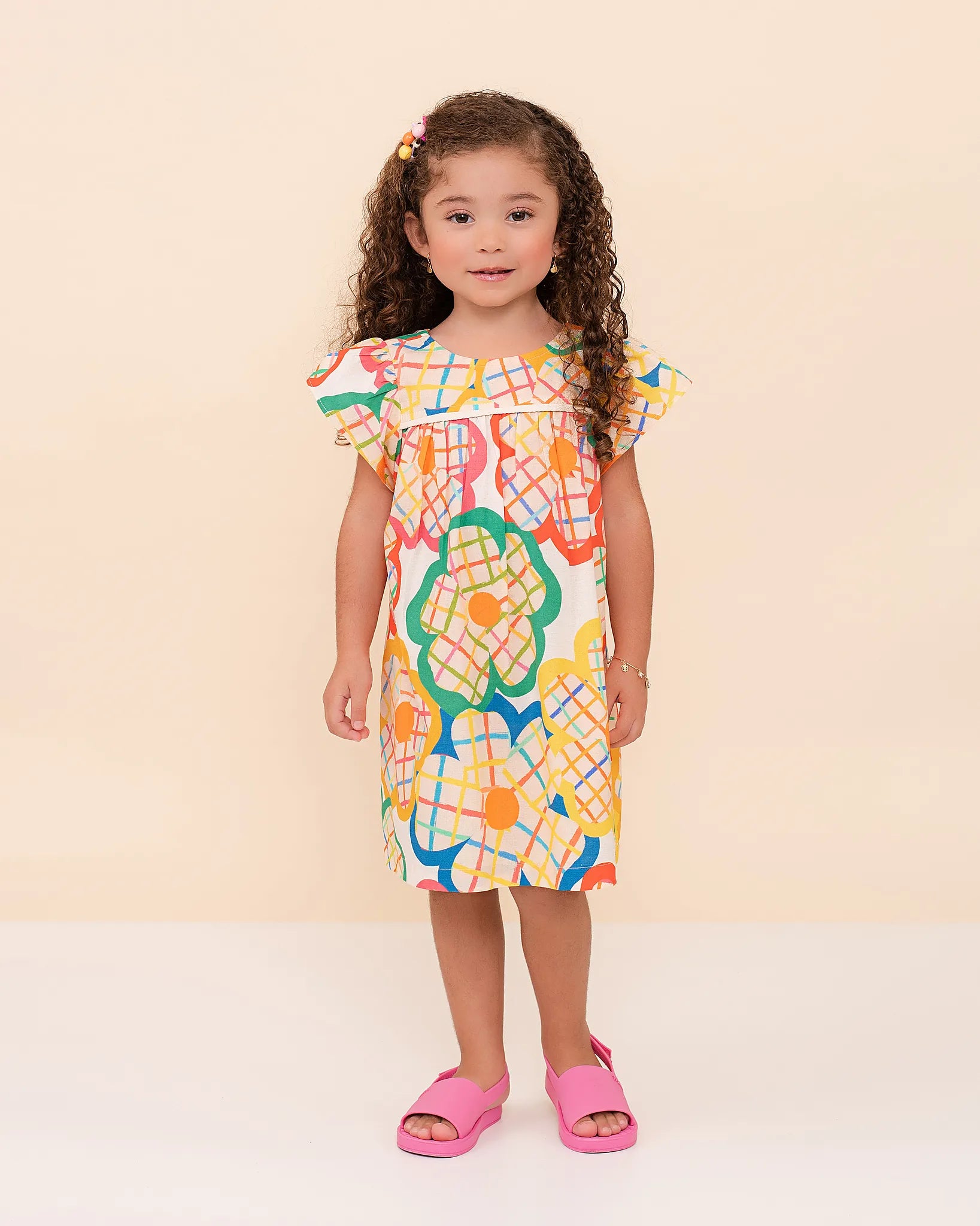 Vestido infantil feminino com estampa floral colorida e alças largas, ideal para meninas de 0 a 3 anos