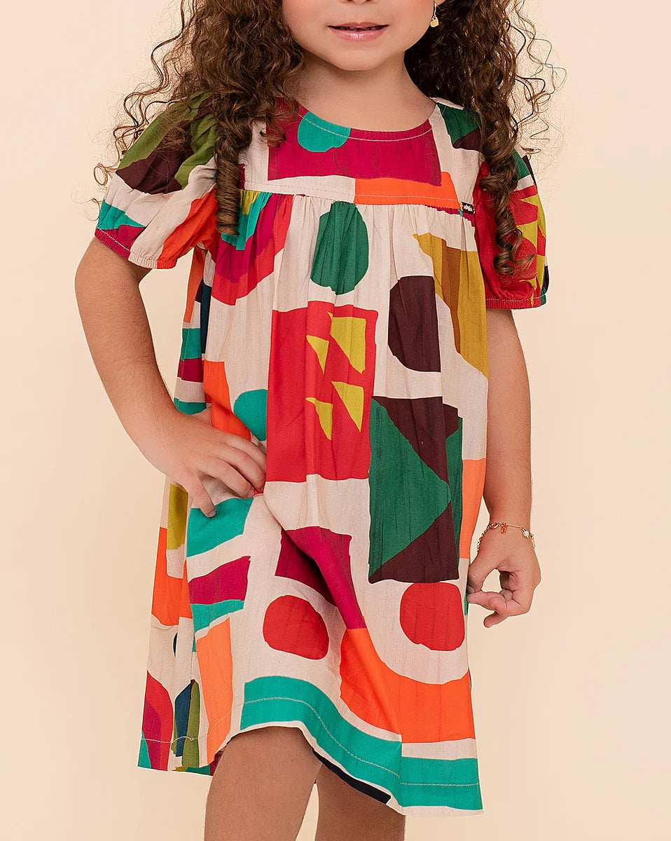 Vestido infantil com estampa geométrica colorida e mangas curtas, ideal para meninas de 0 a 3 anos