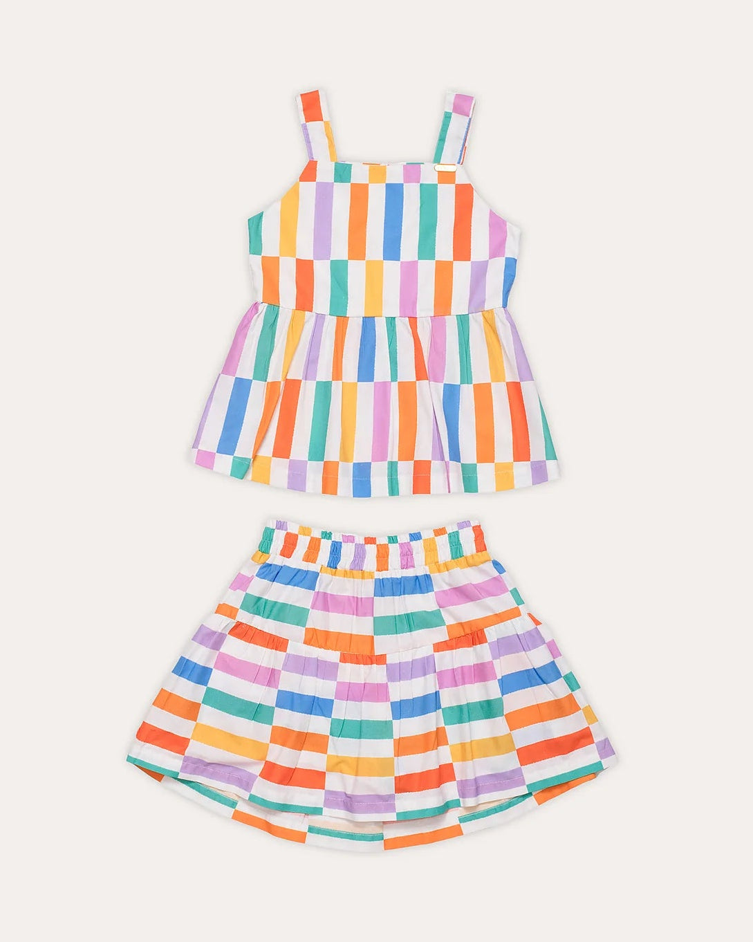 Conjunto infantil feminino com blusa de alças e saia curta listrada em cores vibrantes