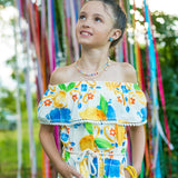 Macacao feminino infantil com estampa de limões e flores em azul e amarelo