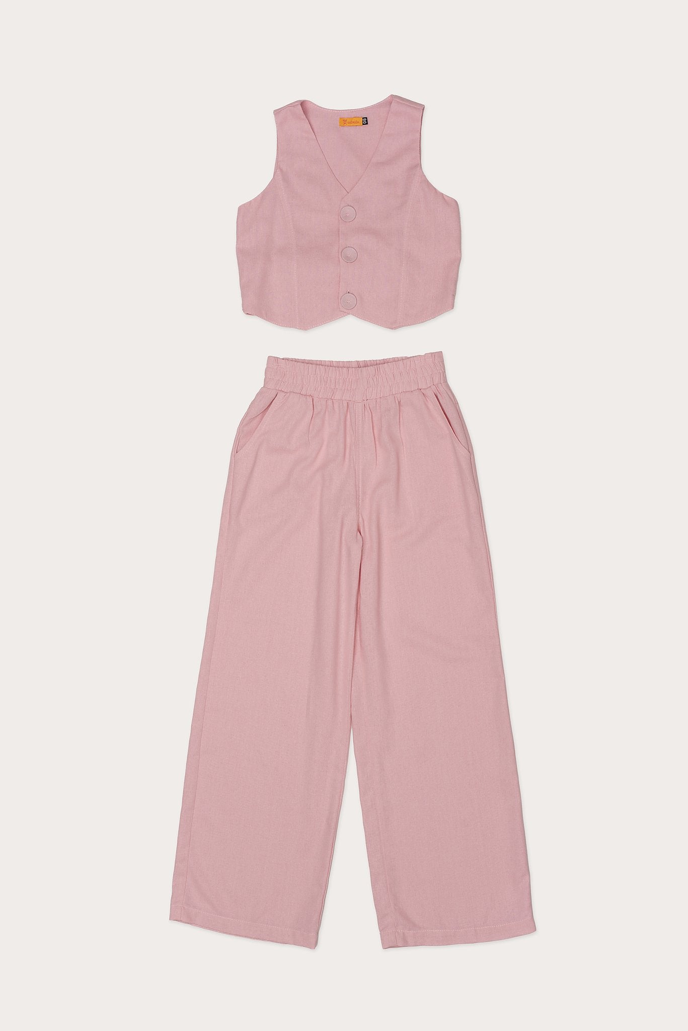Conjunto feminino infantil com colete e calças largas, detalhe de botões no colete
