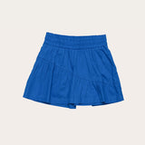 Conjunto infantil feminino azul com blusa de alças largas e saia-short com camadas