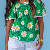 Conjunto infantil feminino com blusa verde de flores brancas e short branco