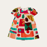 Vestido infantil com estampa geométrica colorida e mangas curtas, ideal para meninas de 0 a 3 anos