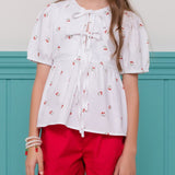 Conjunto infantil feminino com blusa de cerejas e short vermelho