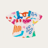 Conjunto infantil feminino com blusa de mangas amplas e shorts, estampa geométrica colorida