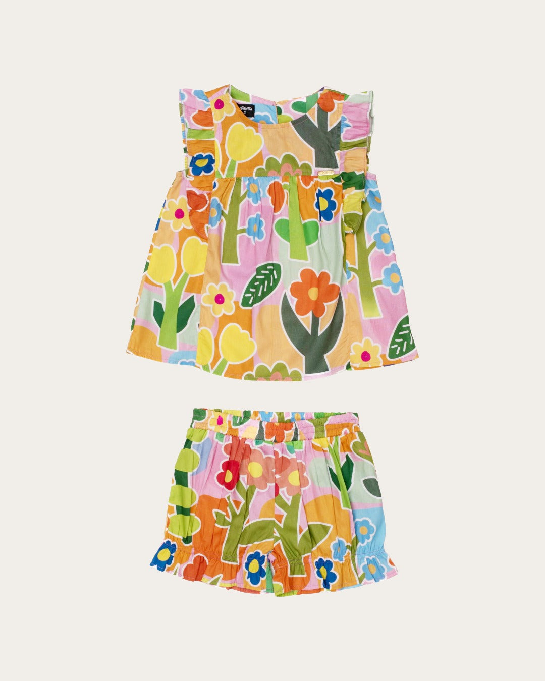 Conjunto infantil feminino com blusa de alças largas e saia, estampa floral colorida