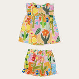 Conjunto infantil feminino com blusa de alças largas e saia, estampa floral colorida