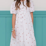 Vestido infantil com estampa de cerejinhas e mangas bufantes, saia rodada