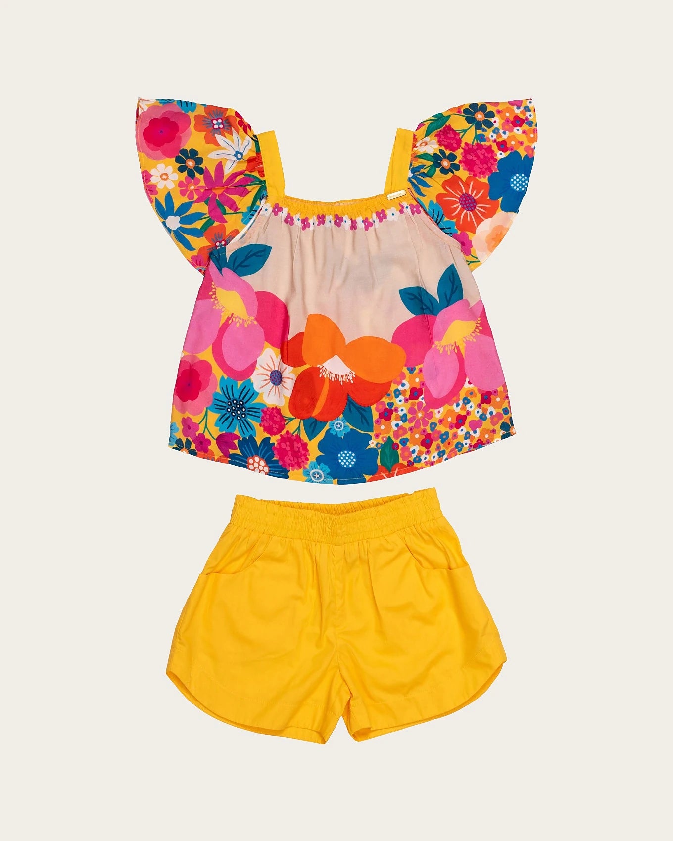 Conjunto infantil feminino com blusa floral colorida e short amarelo