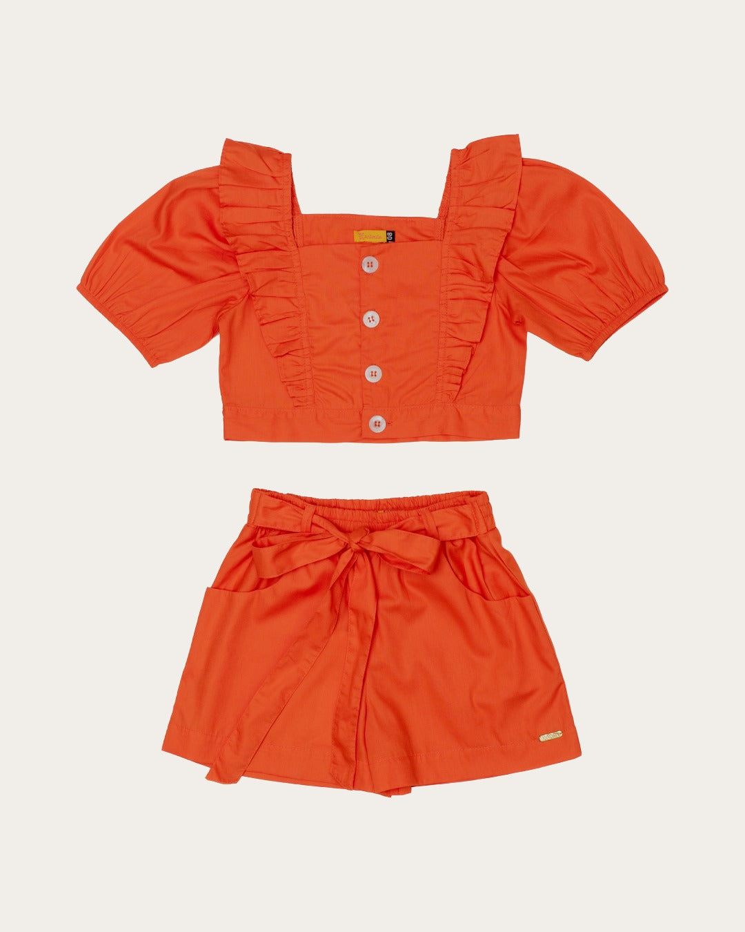 Conjunto feminino infantil coral com blusa de babados e short leve