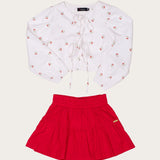 Conjunto feminino infantil com blusa de cerejas e saia vermelha