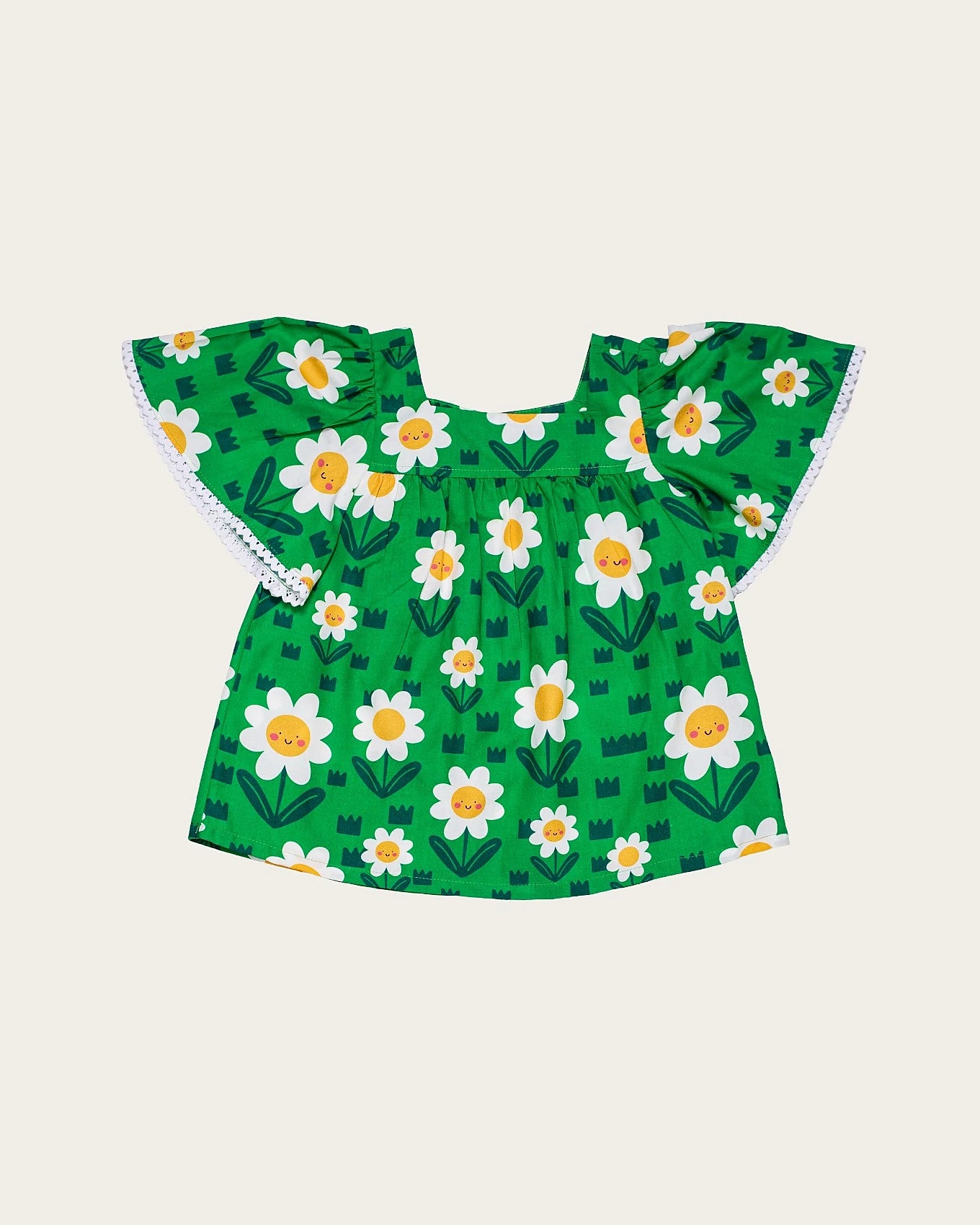 Conjunto infantil feminino com blusa verde de flores brancas e short branco