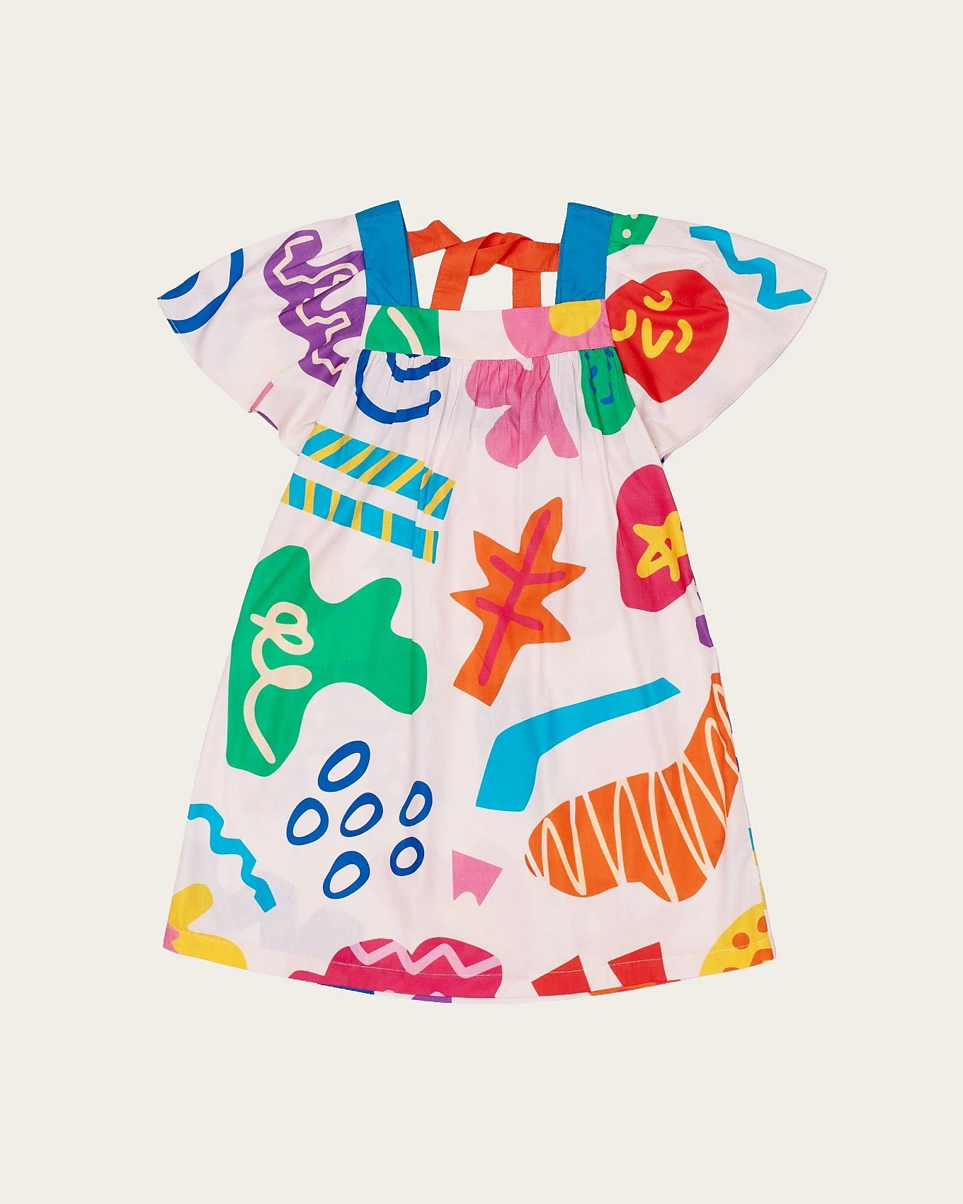 Vestido infantil com estampa colorida de formas geométricas e mangas amplas