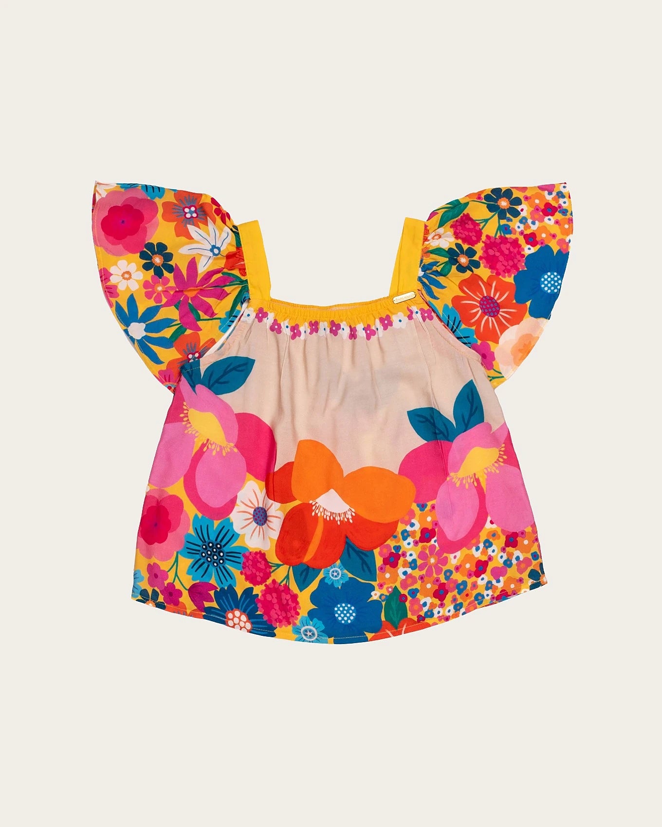 Conjunto infantil feminino com blusa floral colorida e short amarelo
