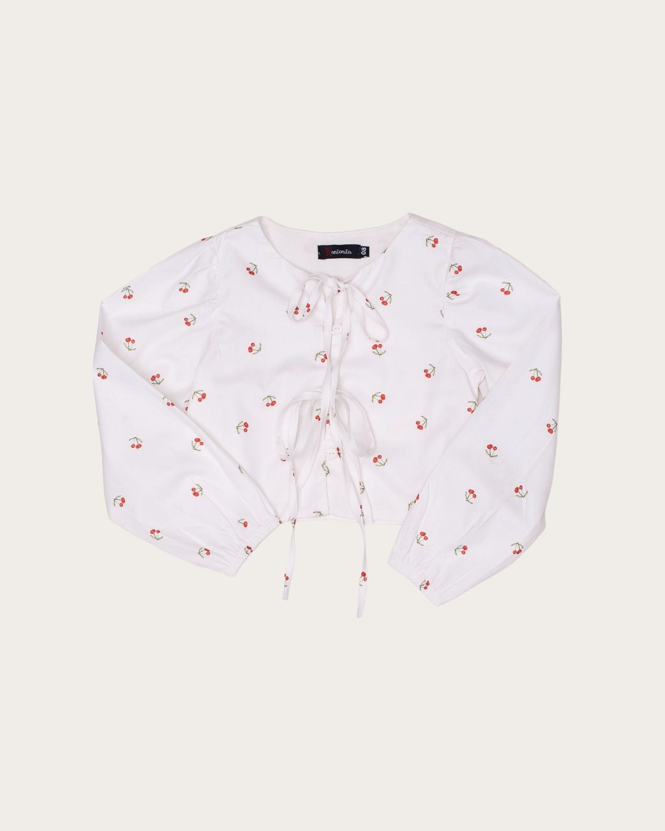 Conjunto feminino infantil com blusa de cerejas e saia vermelha