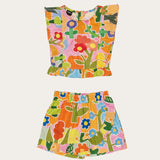 Conjunto infantil feminino com blusa de alças largas e saia estampada com flores coloridas