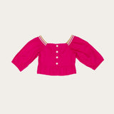 Conjunto rosa infantil feminino com blusa de mangas longas e short com babados