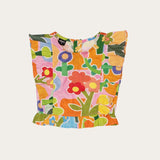 Conjunto infantil feminino com blusa de alças largas e saia estampada com flores coloridas