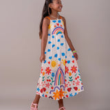 Vestido longo infantil com estampa de arco-íris, flores e nuvens coloridas