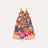 Macacão floral colorido com flores em tons vibrantes e alças largas, feminino infantil