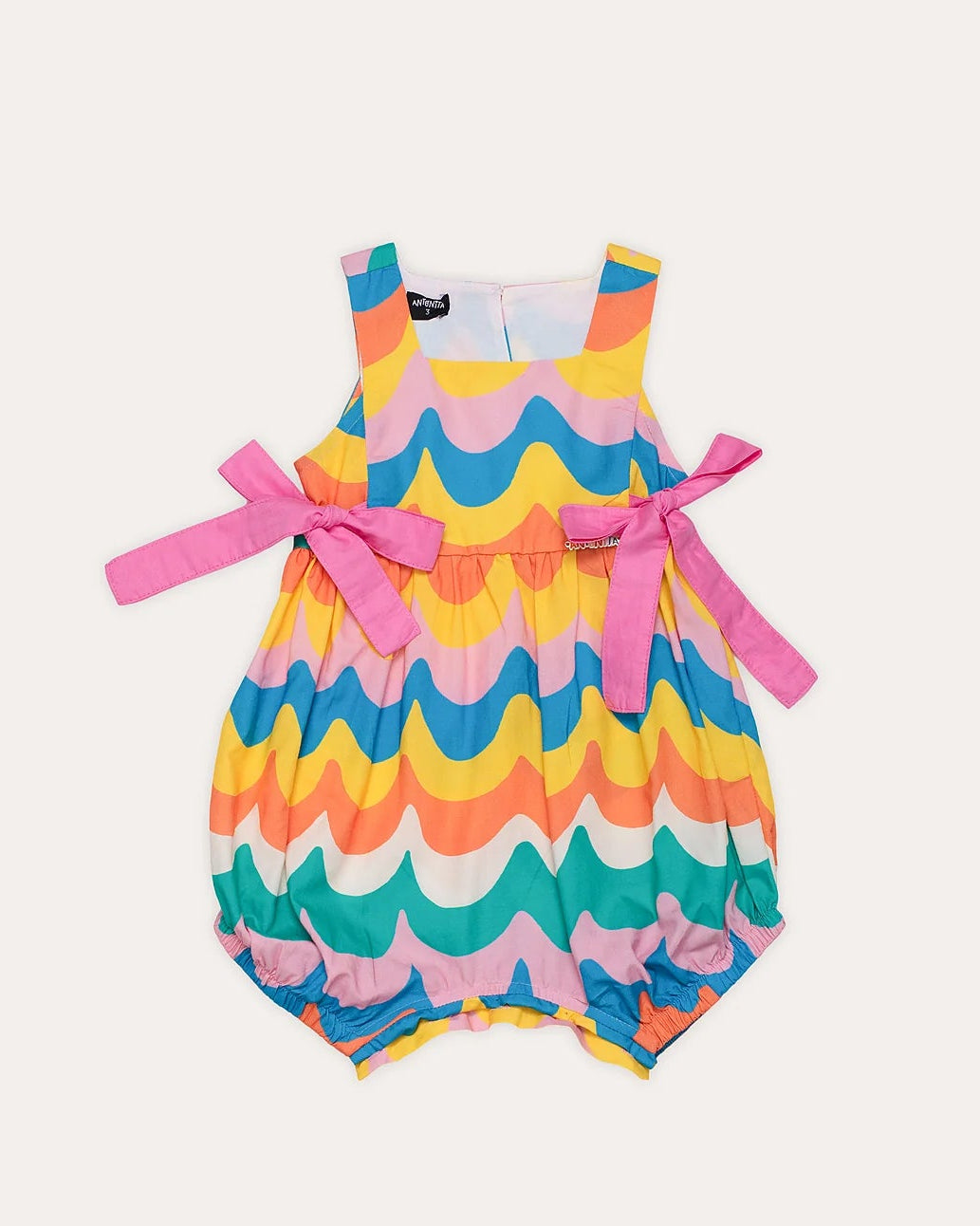 Romper feminino infantil com estampa de ondas coloridas e laços laterais