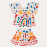 Conjunto infantil feminino com blusa de mangas bufantes e saia rodada, estampa colorida de arco-íris e flores