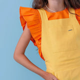 Blusa feminina infantil com mangas amplas e caimento leve, detalhes franzidos.