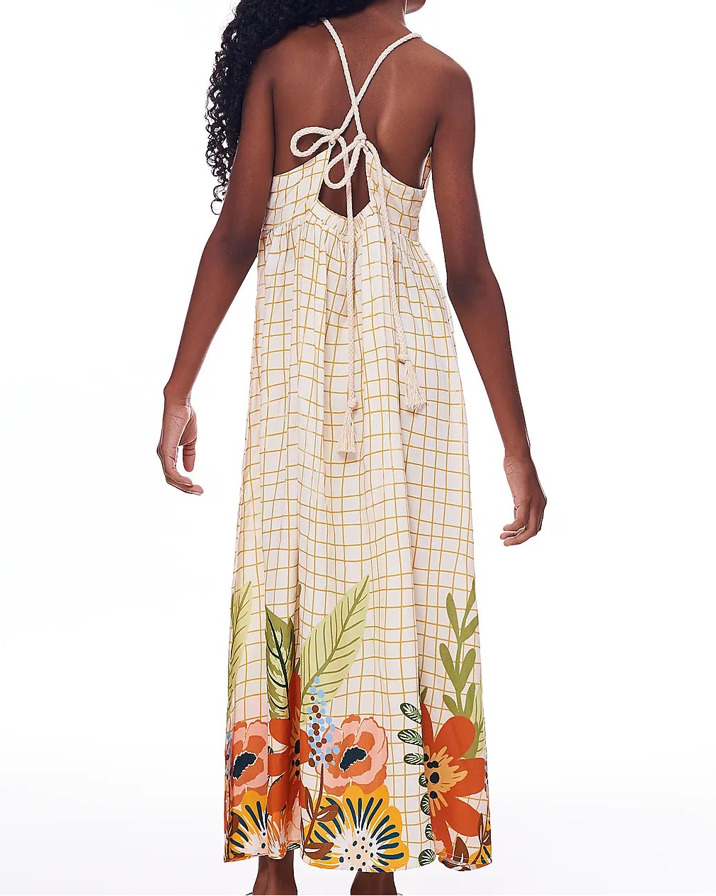 Vestido longo feminino infantil com estampa floral colorida e fundo xadrez