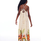 Vestido longo feminino infantil com estampa floral colorida e fundo xadrez